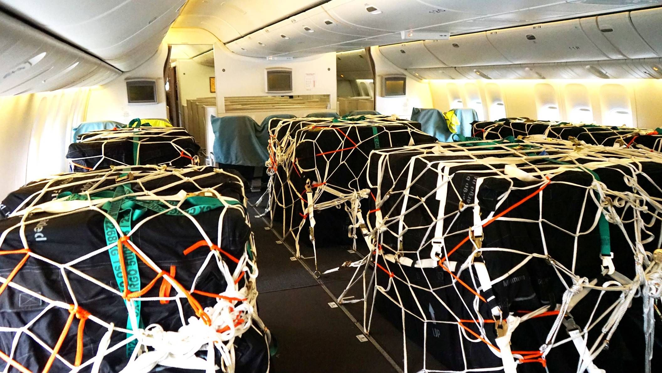 Airline with baggages secured to seats